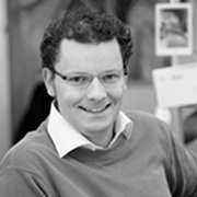 A portrait photo of Jörg Müller